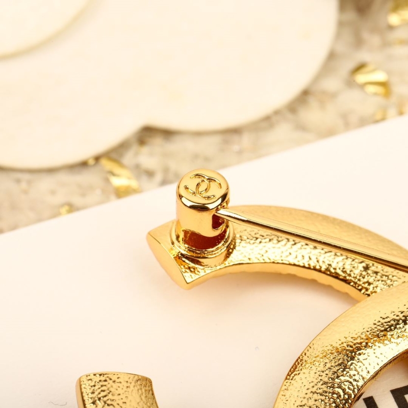 Ch**el brooches